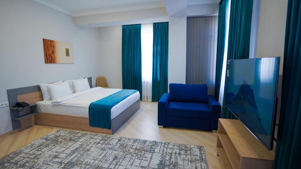 Almalyk Plaza Hotel Olmaliq エクステリア 写真