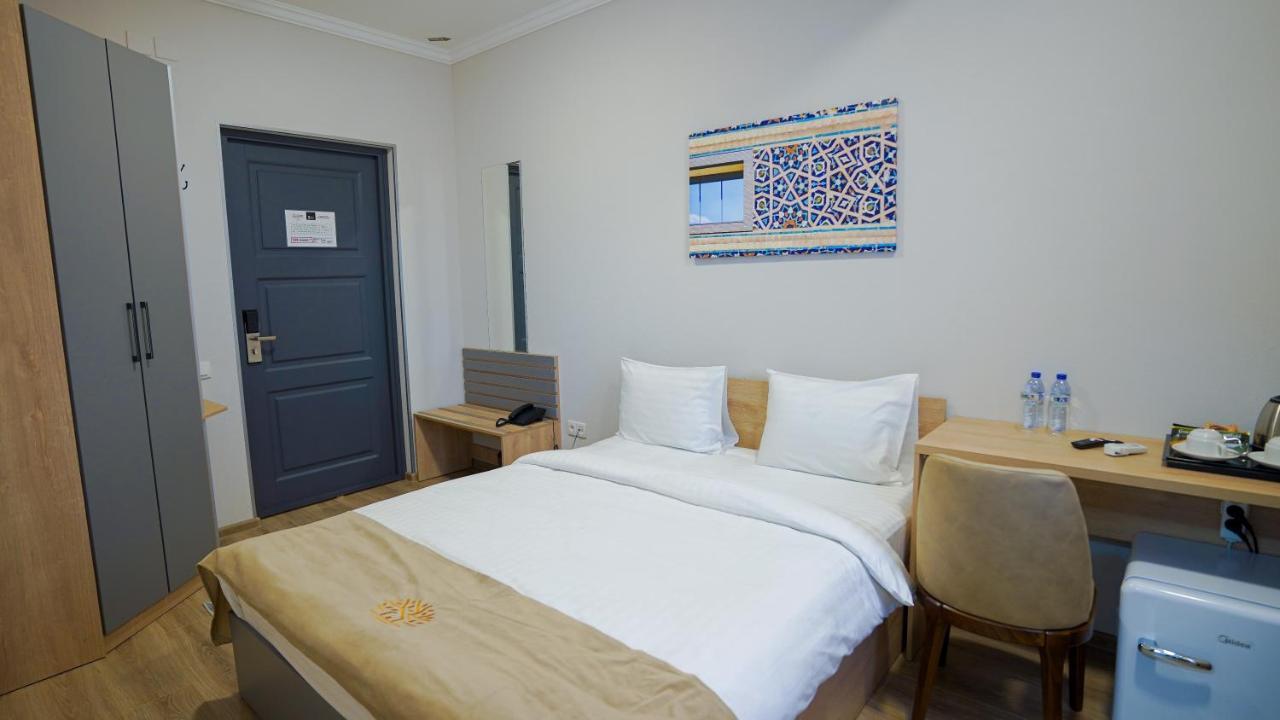 Almalyk Plaza Hotel Olmaliq エクステリア 写真